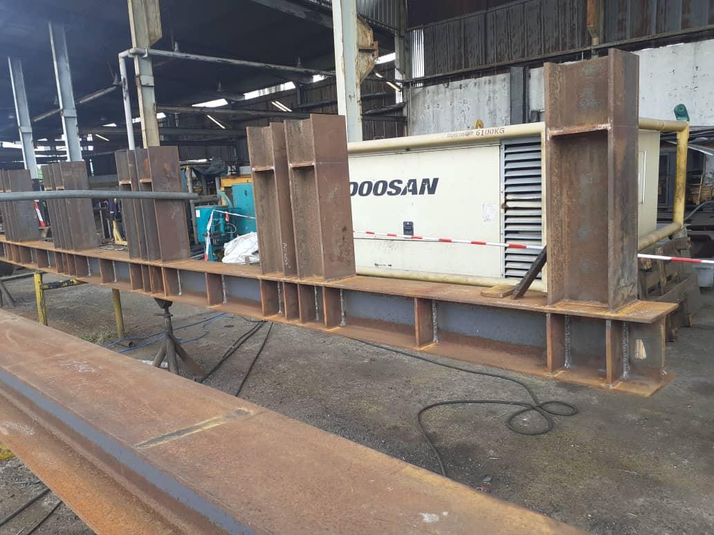 Fabrication equipment and materials staged in the workshop